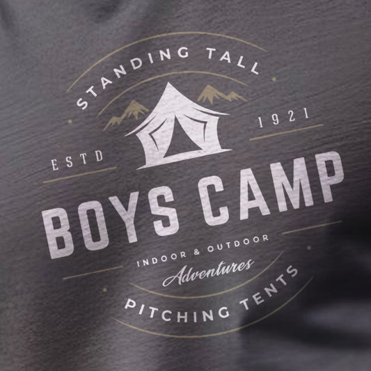 Boys Camp logo with tent graphic and text on a dark background